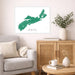 Living room with a map of Nova Scotia on the wall, a couch, and a side table with a vase and books.