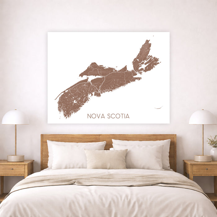 Map of Nova Scotia on a wall above a bed in a bedroom setting