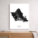 Map of Oahu, Hawaii on a white background in a frame on a wooden surface.