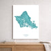 Framed map of Oahu, Hawaii on a wall above a wooden shelf.