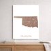 Map of Oklahoma on a white background, framed and leaning against a light gray wall.