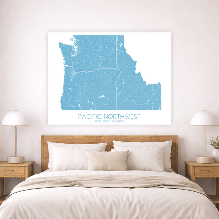 Bedroom with a map of the Pacific Northwest on the wall above a bed.