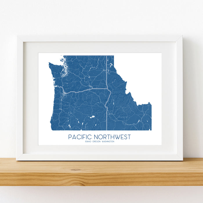 Framed map of the Pacific Northwest on a white wall