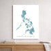 Map of the Philippines on a white wall above a wooden shelf.