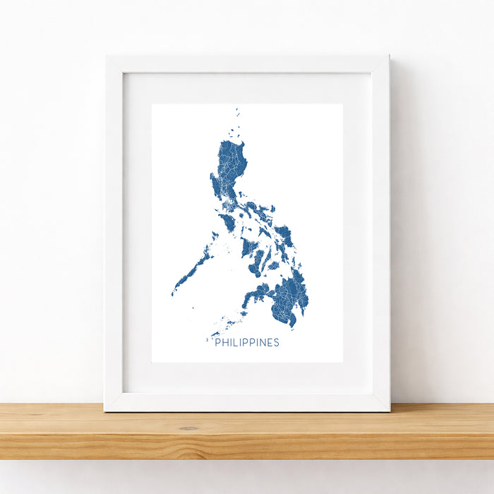 Framed map of the Philippines on a white wall