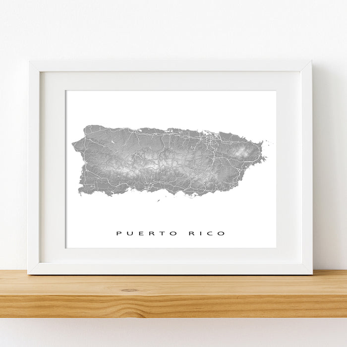 Framed map of Puerto Rico on a white wall