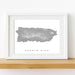 Framed map of Puerto Rico on a white wall