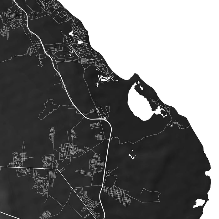 Black and white map of a coastal area with roads and water bodies.