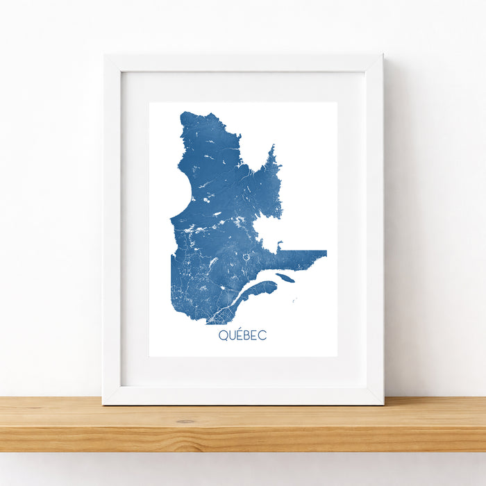 Framed map of Quebec on a white wall