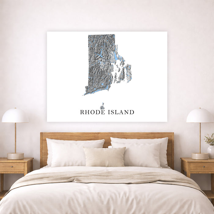 Map of Rhode Island on a wall above a bed in a bedroom