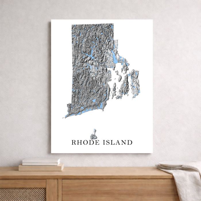 Map of Rhode Island on a wall above a wooden surface