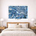 Framed map of Richmond on a wall above a bed with nightstands and lamps.