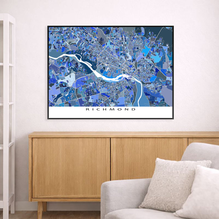 Framed map of Richmond on a wall above a wooden cabinet and sofa.