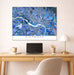 Map of Richmond on a wall above a desk with a laptop and lamp.