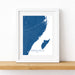 Framed map print of Riviera Maya, Mexico on a white wall.