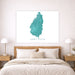 Framed map of Saint Lucia on a wall above a bed in a bedroom.