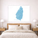 Map of St. Lucia on a wall above a bed in a bedroom