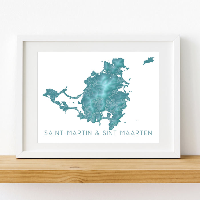 Framed map print of Saint-Martin and Sint Maarten on a white wall.