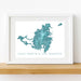 Framed map print of Saint-Martin and Sint Maarten on a white wall.