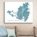 Framed map of Saint Martin on a wall above a beige sofa with light blue pillows.