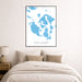 Framed map of San Juan Islands above a bed in a bedroom