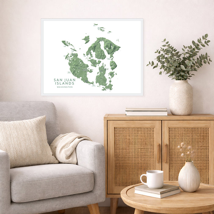 Living room with a map of San Juan Islands on the wall, a couch, and a wooden cabinet.