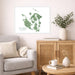 Living room with a map of San Juan Islands on the wall, a couch, and a wooden cabinet.