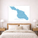 Map of Santa Catalina on a wall above a bed with wooden headboard and nightstands.