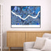 Framed map of Seoul on a wall above a wooden cabinet and sofa.