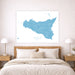 Map of Sicily on a wall above a bed in a bedroom