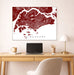 Map of Singapore on a wall above a desk with a laptop and lamp.