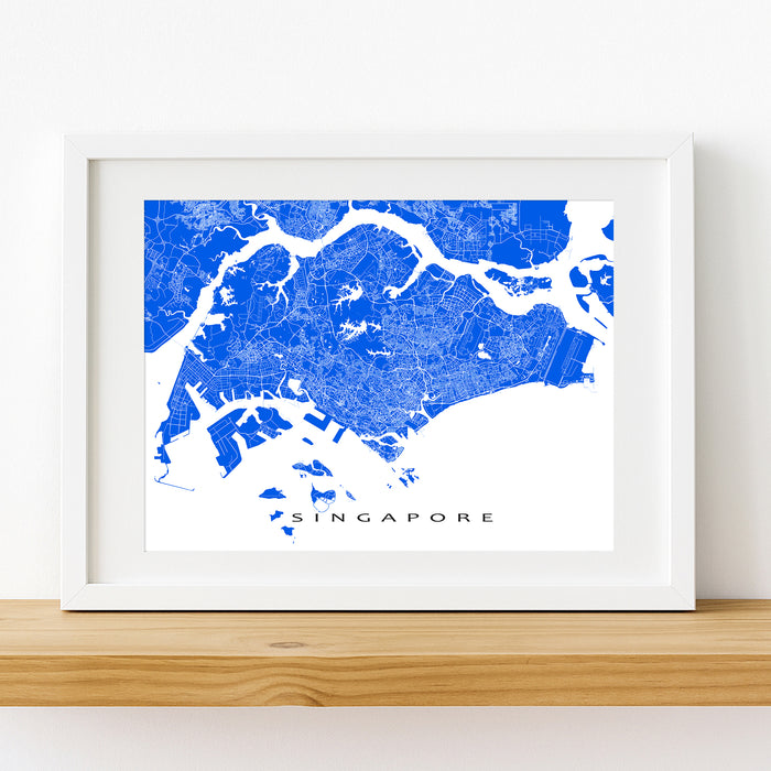 Framed map of Singapore on a white wall