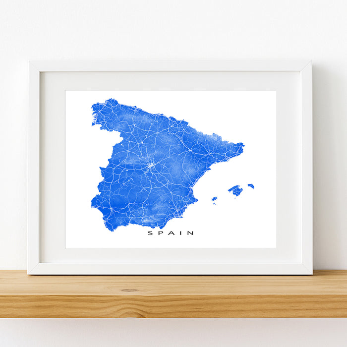 Framed map of Spain with blue roads on a white background