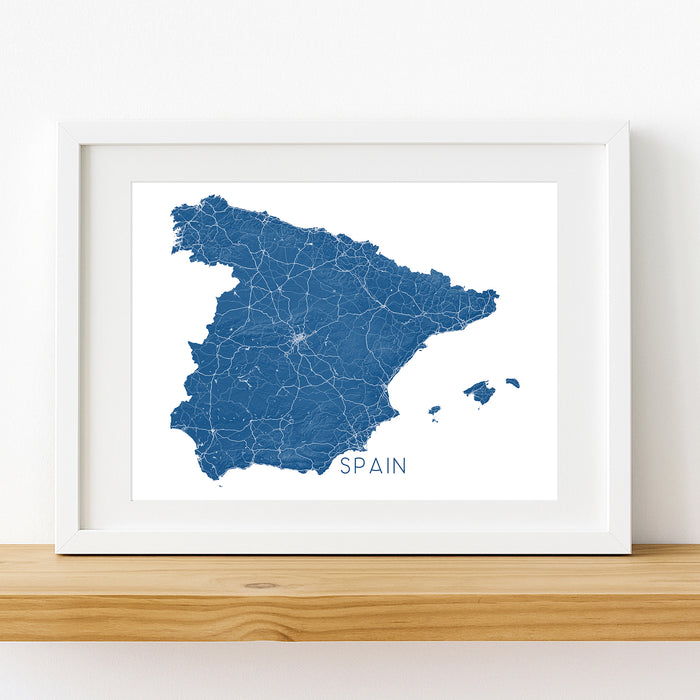 Framed map of Spain on a white wall