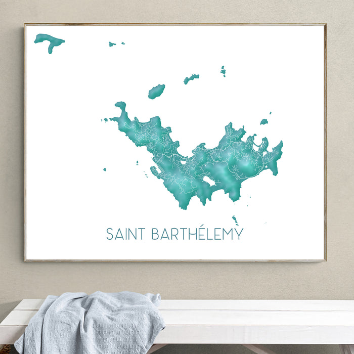 Framed map of Saint Barthélemy on a wall above a bench.
