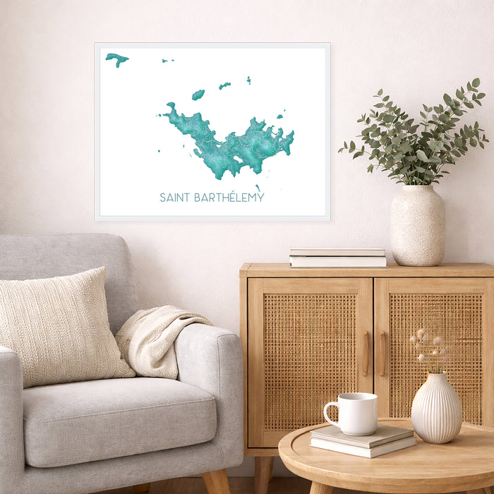 Living room with a gray sofa, wooden cabinet, and decorative items including a map of Saint Barthelemy.