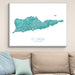 Framed map of St. Croix, US Virgin Islands on a wall above a beige sofa with light blue pillows.