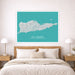 Map of St. Croix on a teal background above a bed in a bedroom.