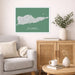 Living room with a map of St. Croix on the wall, a couch, and a side table with a plant and books.