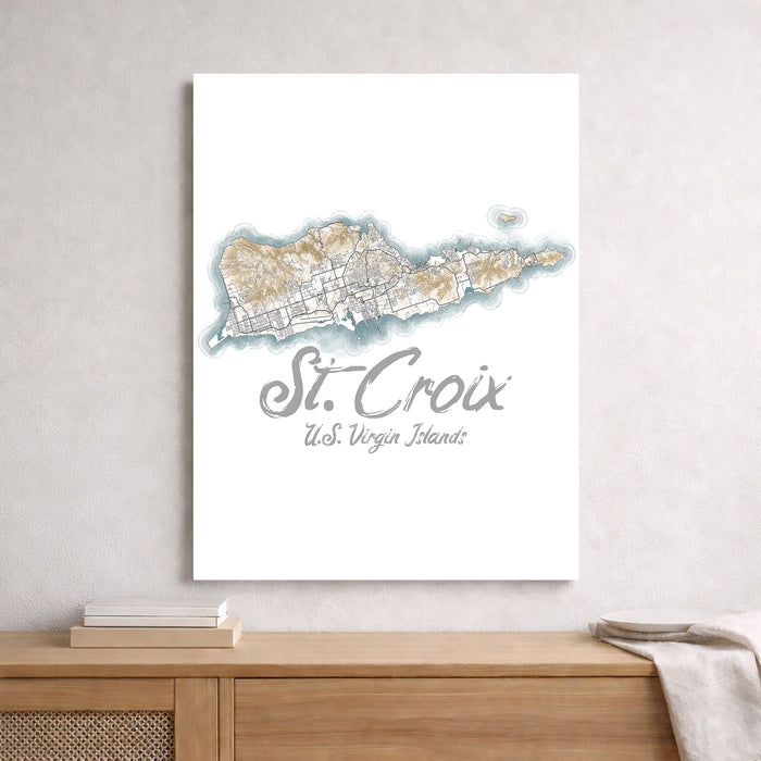 Map of St. Croix, U.S. Virgin Islands on a white wall above a wooden shelf.