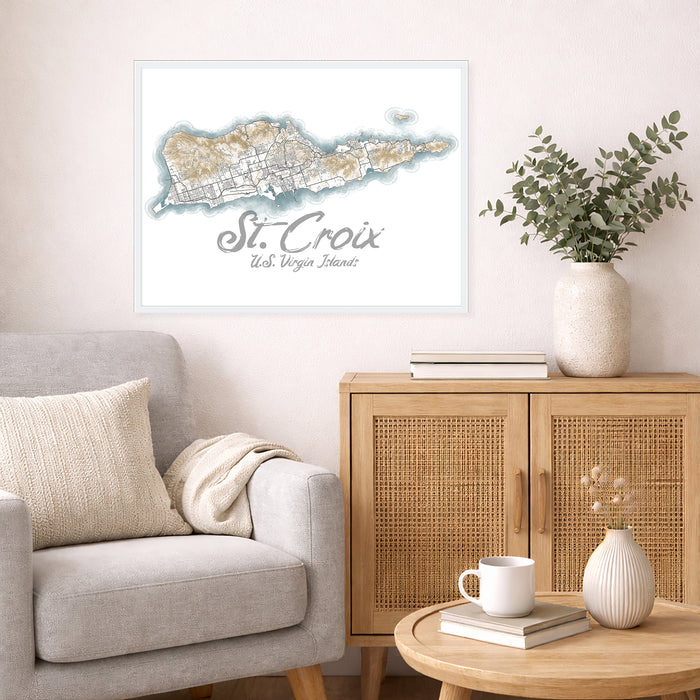 Living room with a map of St. Croix on the wall, a couch, and a wooden cabinet.