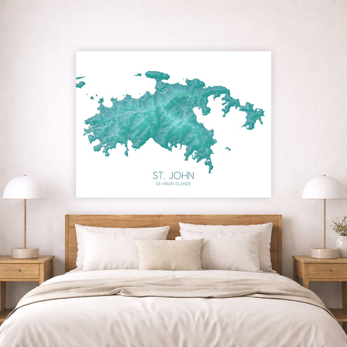 Unframed map of St. John, US Virgin Islands, above a bed in a bedroom.