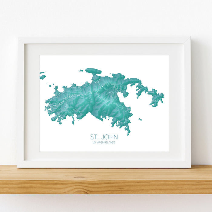 Framed map of St. John, U.S. Virgin Islands on a white wall.