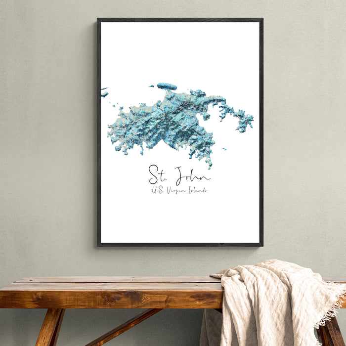 Framed map of St. John, U.S. Virgin Islands on a wall above a wooden bench.