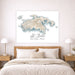 Contour map of St. John U.S. Virgin Islands on a wall above a bed with wooden headboard and nightstands.