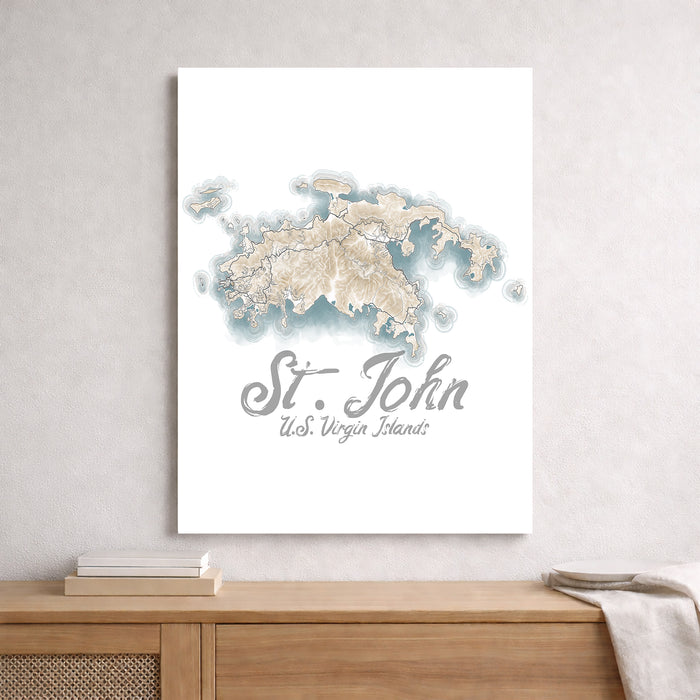Contour map of St. John, U.S. Virgin Islands on a white wall above a wooden shelf.