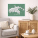 Framed map of St. John on a wall above a sofa in a living room.