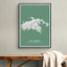 Framed map of St. John, U.S. Virgin Islands on a green background, hanging above a wooden bench.