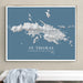 Framed map of St. Thomas on a wall above a white surface.