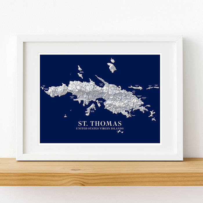 Framed map of St. Thomas, United States Virgin Islands on a white wall.